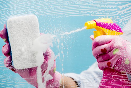 A cleaner servicing washroom and kitchen areas in a local commercial property